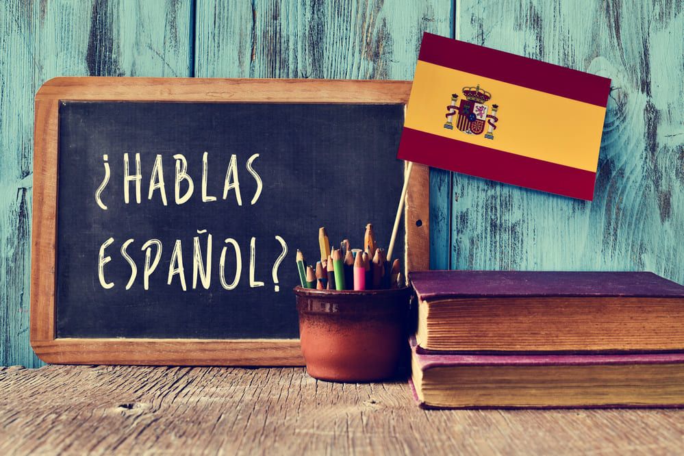 How do I communicate in Spain after moving here?